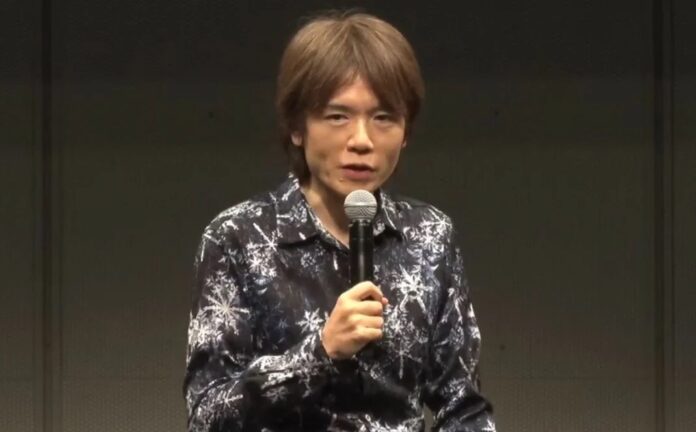 ภาพ Masahiro Sakurai กำลังให้สัมภาษณ์ ในงานเกมแห่งหนึ่ง