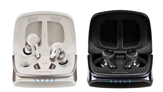 ภาพหูฟังอินเอียร์ไร้สาย Audio-Technica ATH-TWX9MK2 สีขาวและสีดำ วางอยู่ในกล่องชาร์จที่เปิดฝาโชว์ดีไซน์หรูหรา พร้อมไฟแสดงสถานะแบบ LED