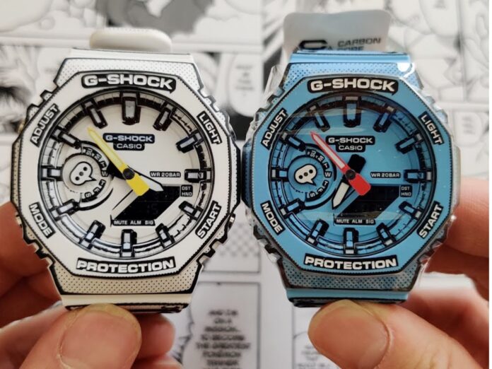 นาฬิกา Casio G-Shock ดีไซน์สไตล์ Manga สองเรือน โทนสีขาวและฟ้า โชว์ลายเส้นแบบการ์ตูนและหน้าปัดรายละเอียดชัดเจน