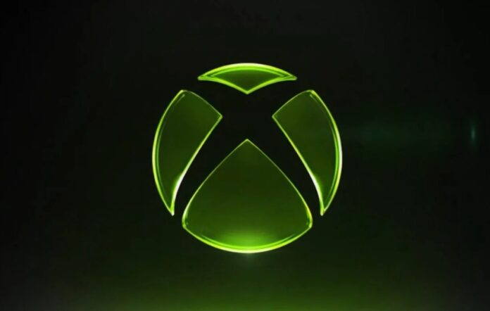 โลโก้ Xbox สีเขียวเรืองแสงบนพื้นหลังสีดำเข้ม
