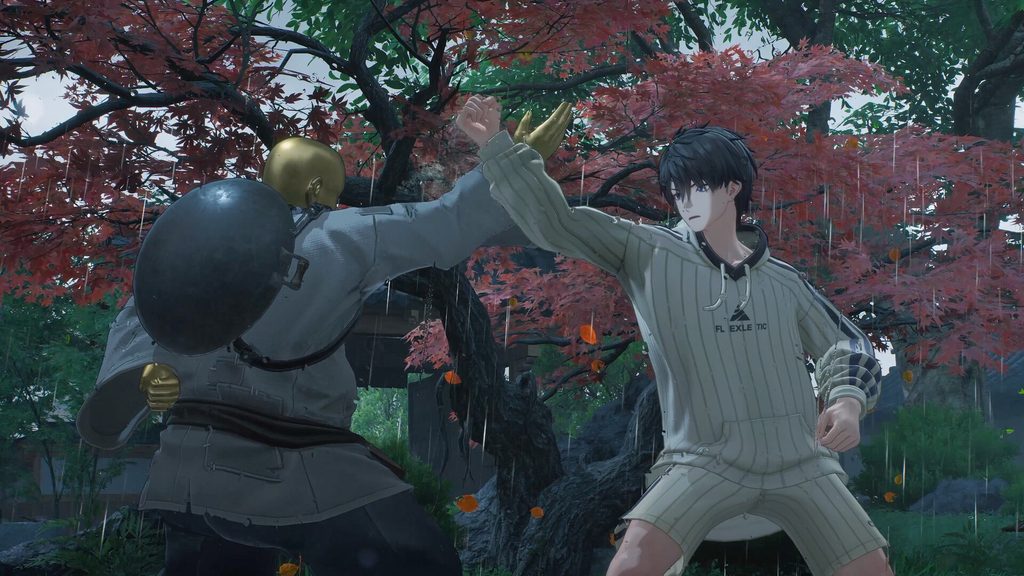 ตัวละครต่อสู้ระยะประชิดท่ามกลางสายฝนและต้นไม้สีแดงในเกม ANANTA
