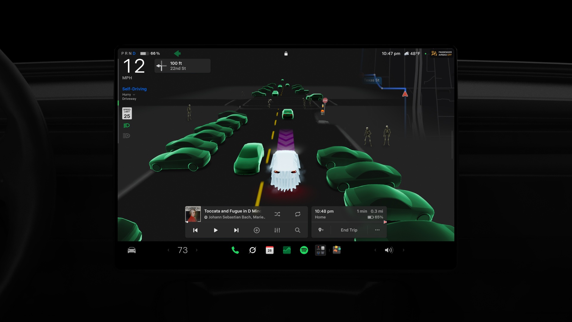 หน้าจอรถ Tesla แสดงอวตารรถคลุมผ้าผี