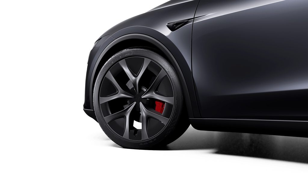 ล้อ Arachnid 2.0 ขนาด 21 นิ้วและคาลิเปอร์เบรกสีแดงของ Tesla Model Y Performance