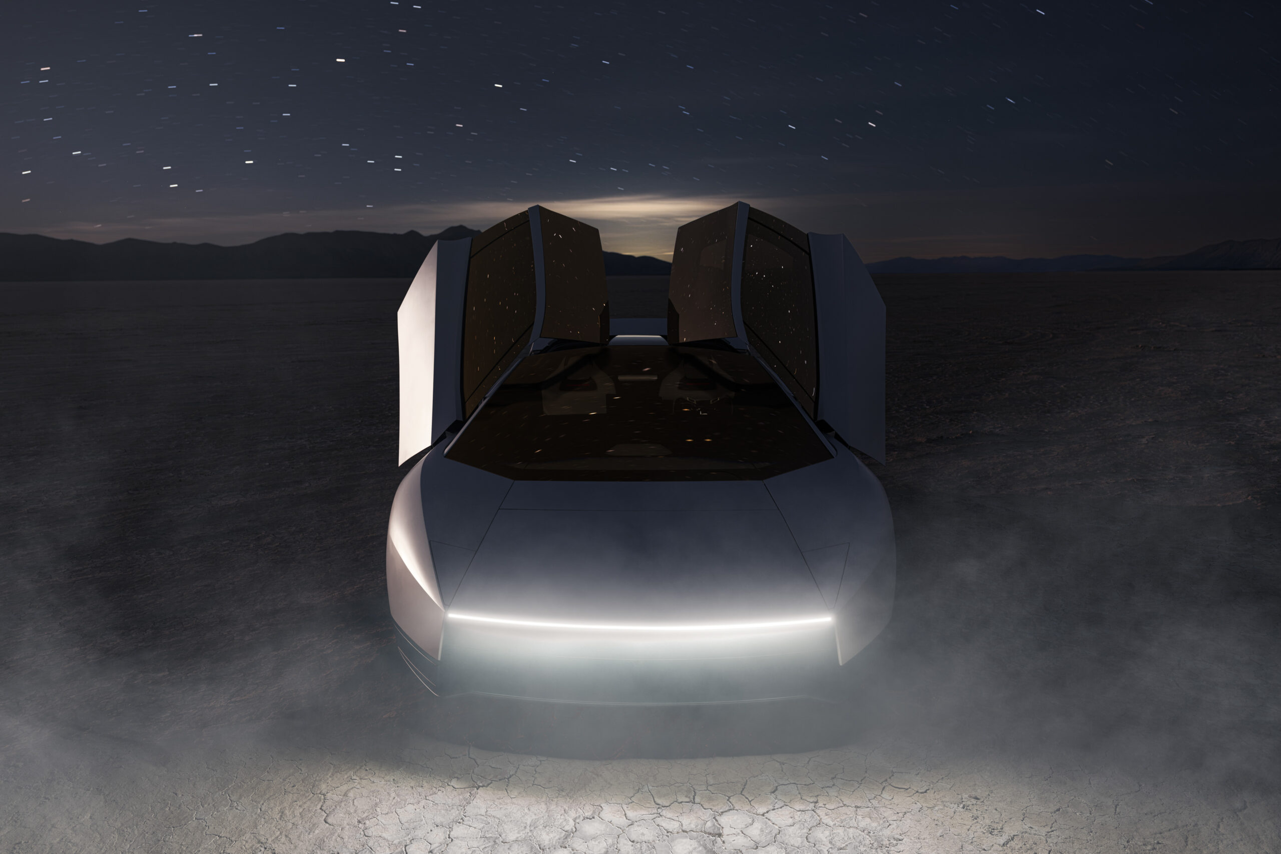 Roadster มองจากด้านหน้า เปิดประตูทั้งสองข้าง ใต้ท้องฟ้ายามค่ำคืน